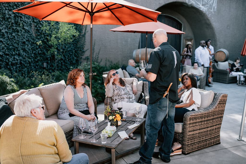 Terrace seating overlooking the Palisades cliffs at Joseph Cellars